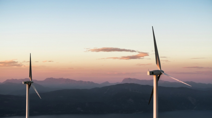 Two white wind turbines