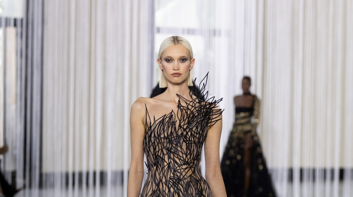  A model walks down a runway 